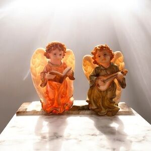 Angels cherubs with book and musical instrument figurines